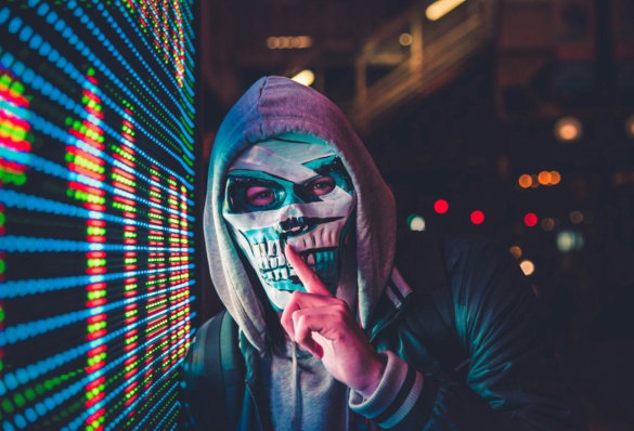 person standing near LED sign
