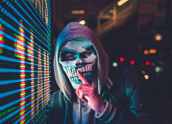person standing near LED sign